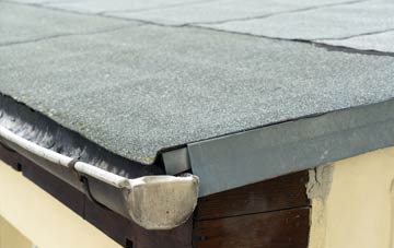repair or replace Hanchett Village flat roofing?